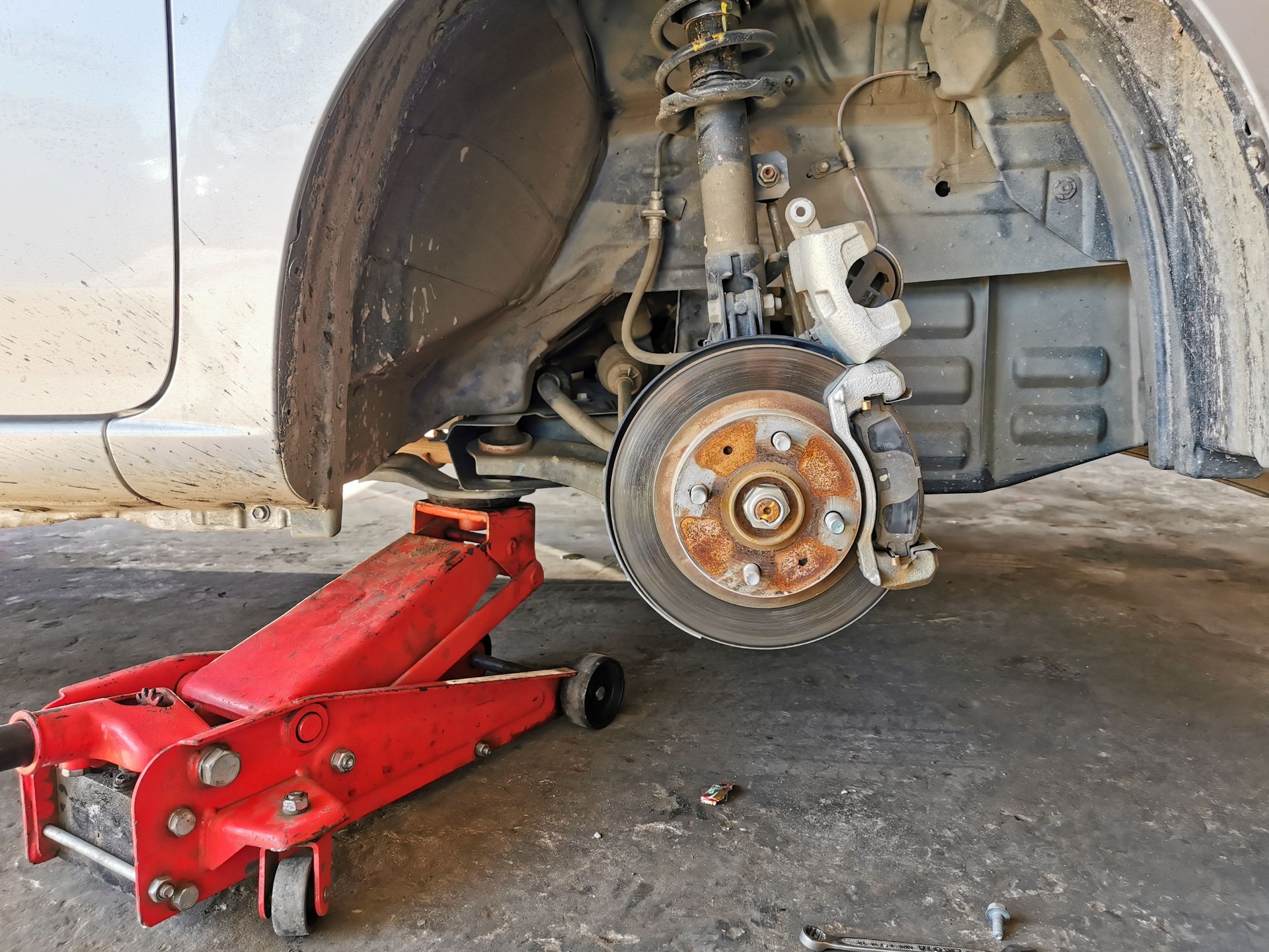 Car brake repairing in progress. Brake pads replacement.
